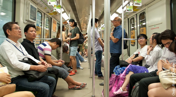 people riding shanghai subway